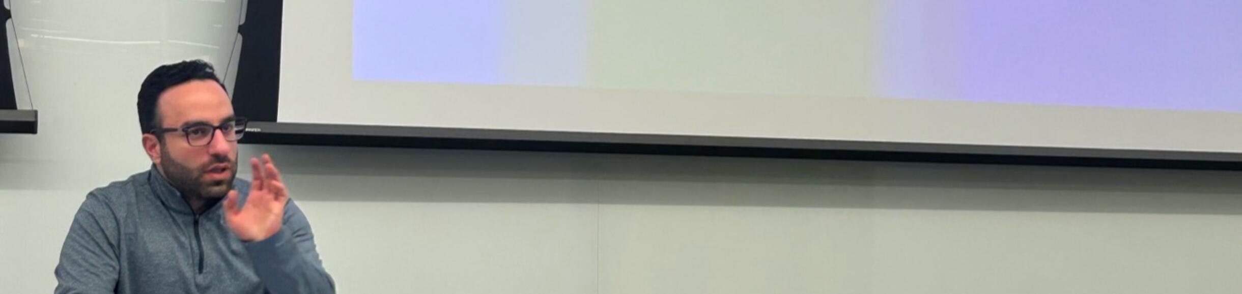 A resident presenting their slides